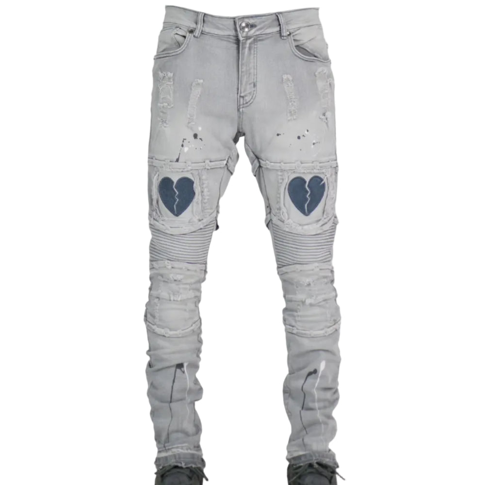 Light gray distressed jeans with heart designs on a white background