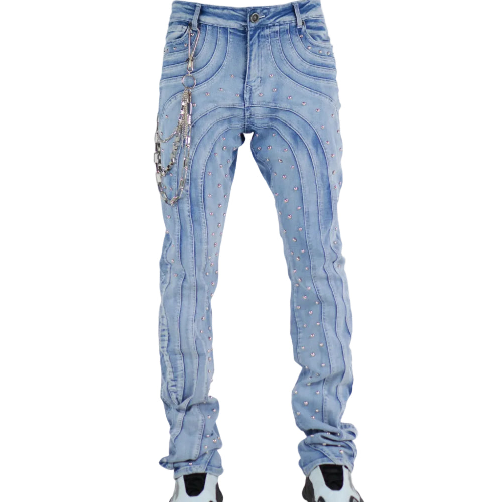 Light wash jeans with decorative elements on a white background