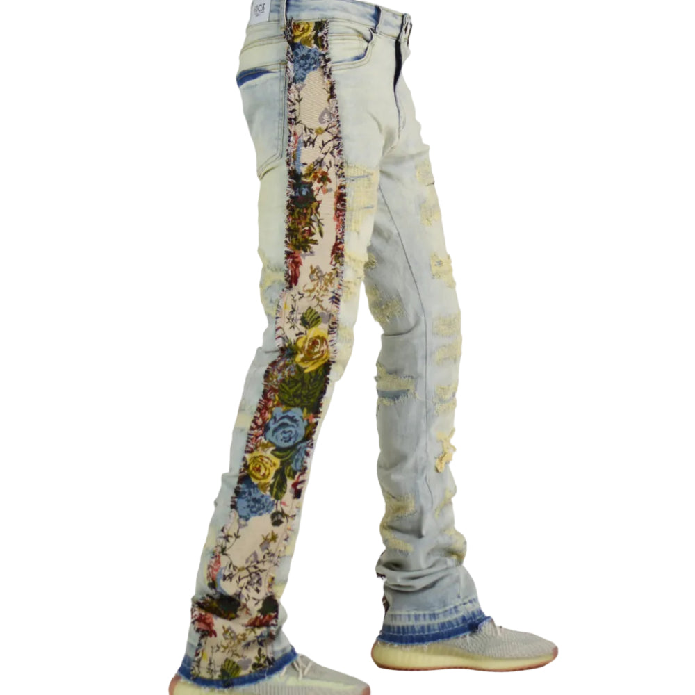 Light blue jeans with floral patterns on a white background
